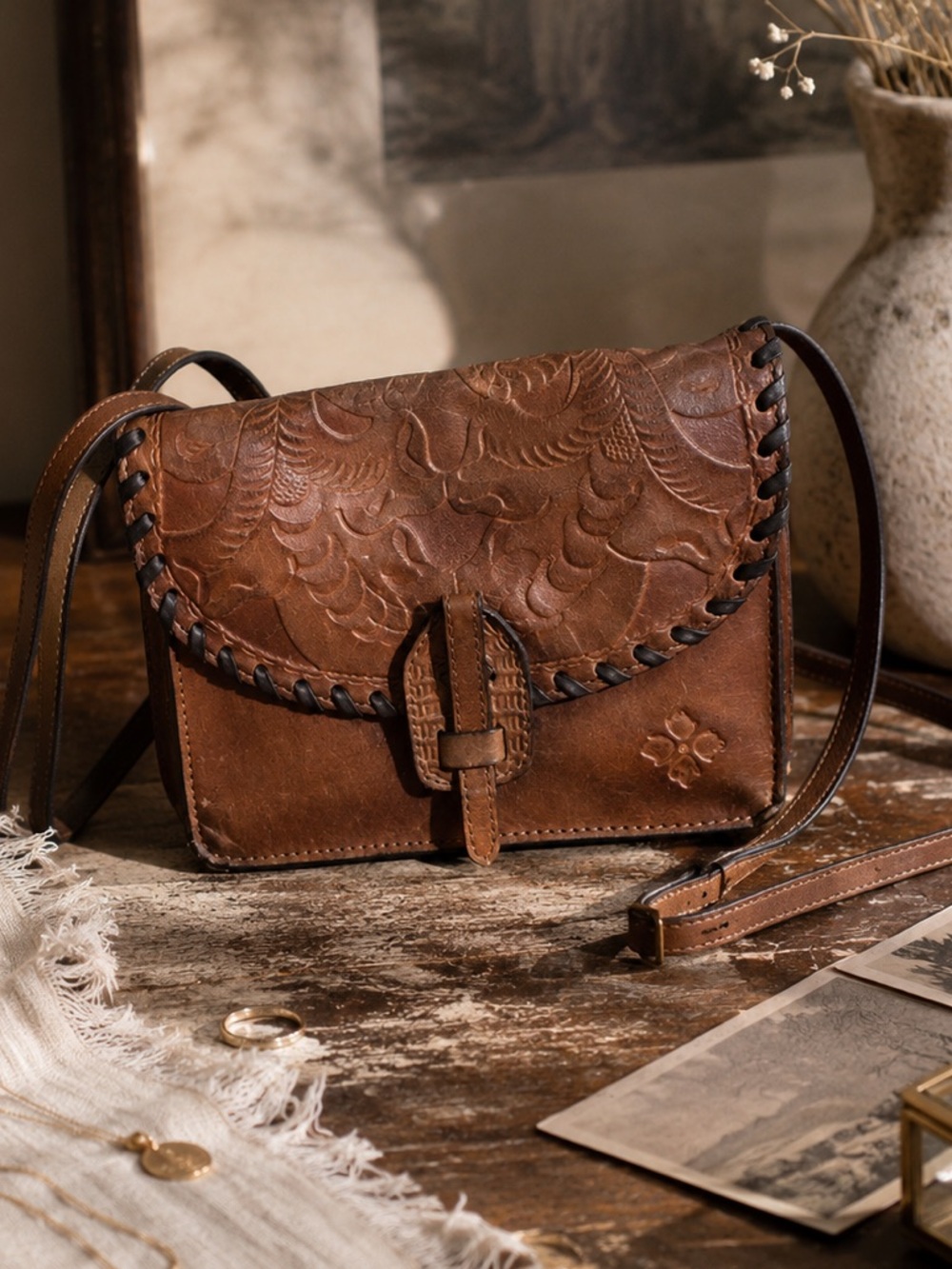 The Patricia Nash Lanza Crossbody Bag Tooling embossed leather Purse